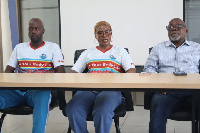 NESWA President Jabulile Thwala flanked by Victor 'Mavikane' Dlamini (R) and Captain Fortune Neves.