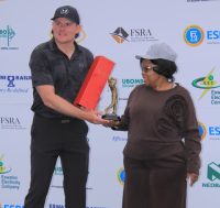 SA Leon Visser receives his trophy from Minister for Tourism and Enviromental Affairs Jane Mkhonta.(Pic:Sanele Jele)