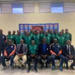 Green Mamba pose for a group picture with EFA president Peter Simelane (4th L)and PLE chairman Polycarp Dlamini (2nd L)ahead of their CAF Confederation Cup clash.(Pic:Sanele Jele)