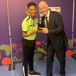 Letticia Viana poses with FIFA President Gianni Infantino.