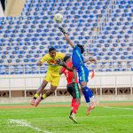 Malawi goalkeeper Julius Banda making a save from Eswatini striker Njongo 'Jakalazi' Mazibuko.(Source: Football Association of Malawi)