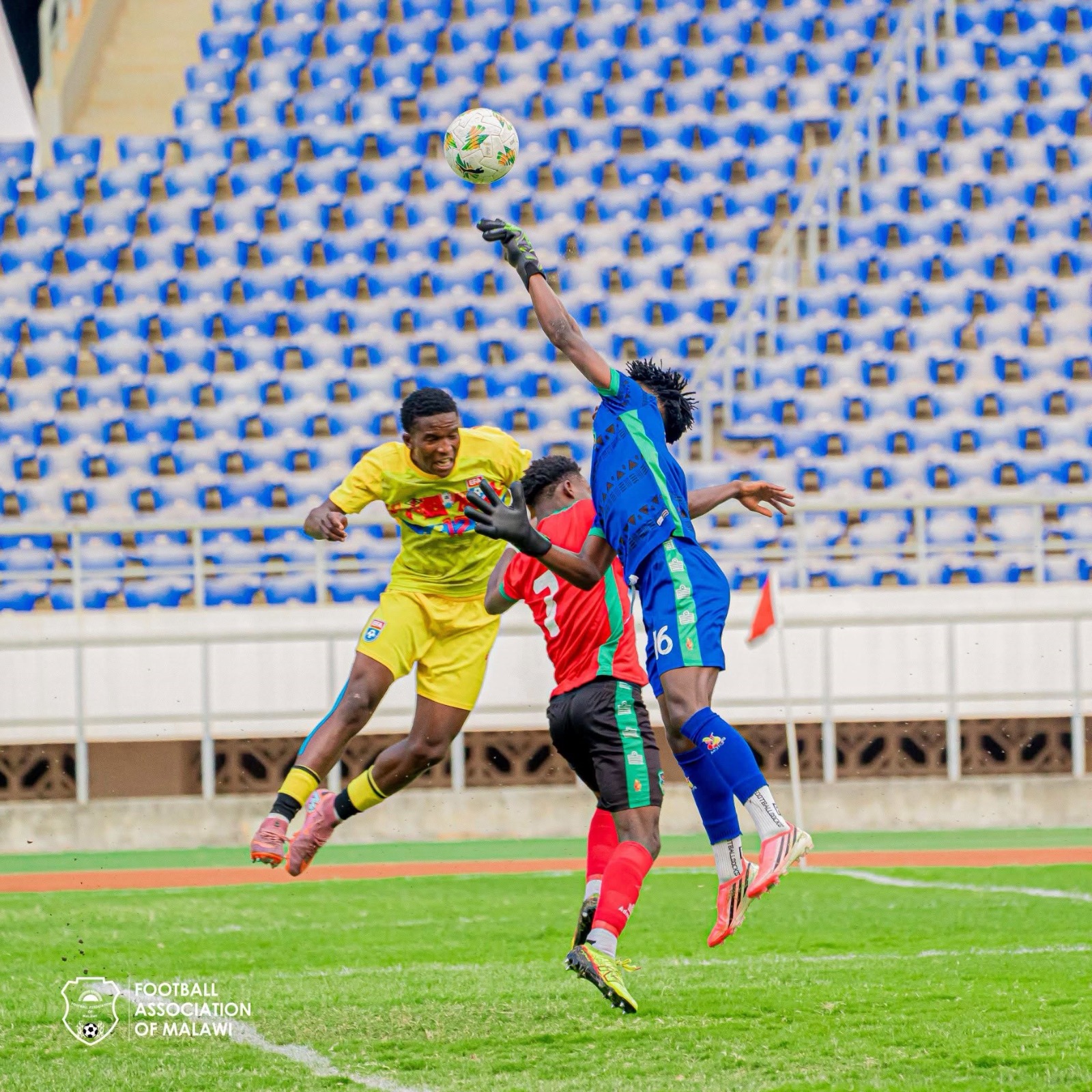 Malawi goalkeeper Julius Banda making a save from Eswatini striker Njongo 'Jakalazi' Mazibuko.(Source: Football Association of Malawi)