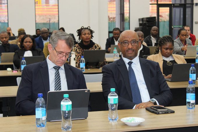 Minister for Finance Neal Rijkenberg and Central Bank Governor Dr Phil Mnisi.