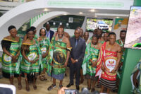 Staff members of Eswatini Electricity Company with His Majesty King Mswati III after the King toured the company’s exhibition stall during the 58th Eswatini International Trade Fair.