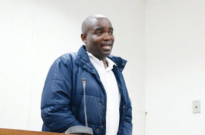 Sazi Wisey Ngcamphalala, accused of theft by false pretences in an E15 000 work permit case, appearing before the Manzini Magistrates Court.(Pic: Siphosethu Dlamini)
