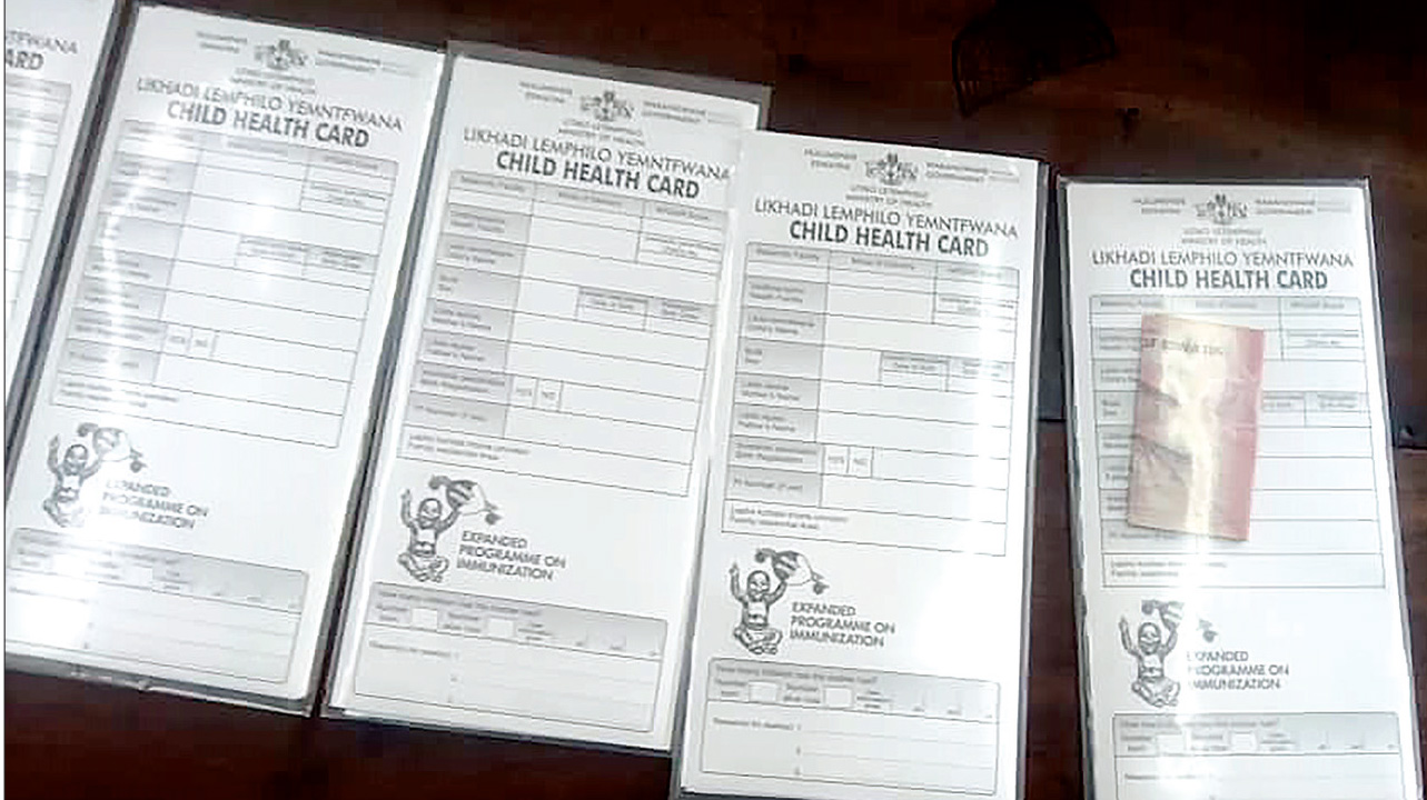 Some of the child health cards allegedly found in the possession of one of the arrested women. Investigations by this publication following the arrest of the two women, revealed that the cards were allegedly being sold for E50 each, despite being provided free of charge at hospitals in Eswatini. (Courtsey pic)