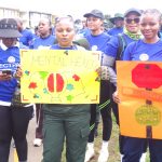 Participants display placards carrying mental health awareness messages during the walk. (Pic: Nimrod Hlophe)