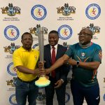 EOCGA representative Zakhele Zulu, AUSC Region 5 torch relay delegation head Arsenio Sarmento and Team Eswatini Chef de Mission Victor ‘Mavikane’ Dlamini with the torch.