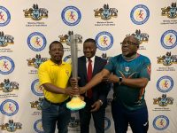 EOCGA representative Zakhele Zulu, AUSC Region 5 torch relay delegation head Arsenio Sarmento and Team Eswatini Chef de Mission Victor ‘Mavikane’ Dlamini with the torch.