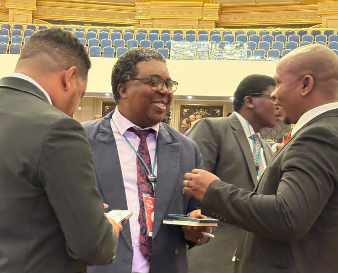 Principal Secretary Sydney Simelane (C).