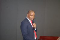 1. Eswatini Posts and Telecommunications Corporation Managing Director Thulani Fakudze makes his remarks during the commemoration of the World Post DAY 2026 at the Happy Vally Hotel.