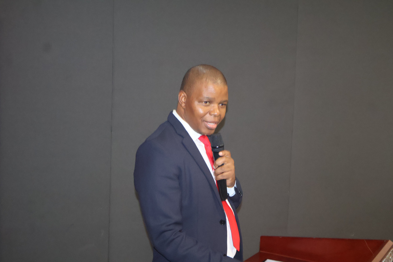 1. Eswatini Posts and Telecommunications Corporation Managing Director Thulani Fakudze makes his remarks during the commemoration of the World Post DAY 2026 at the Happy Vally Hotel.