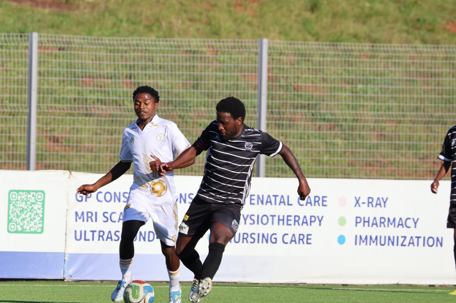 Former Kaizer Chiefs midfielder Siphelele Ntshangase battles for the ball against Nuno Dos Santos of Mbabane Highlanders AM on October 3, 2026. (Pic:Times of Eswatini)