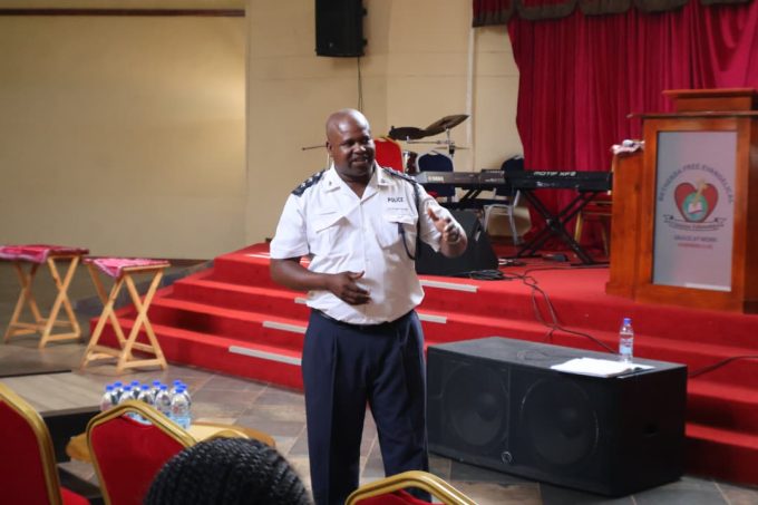Nhlangano Station Commander Mandla Mndzebele addressing the Nhlangano Business Community at Bethesda Church in Nhlangano.
