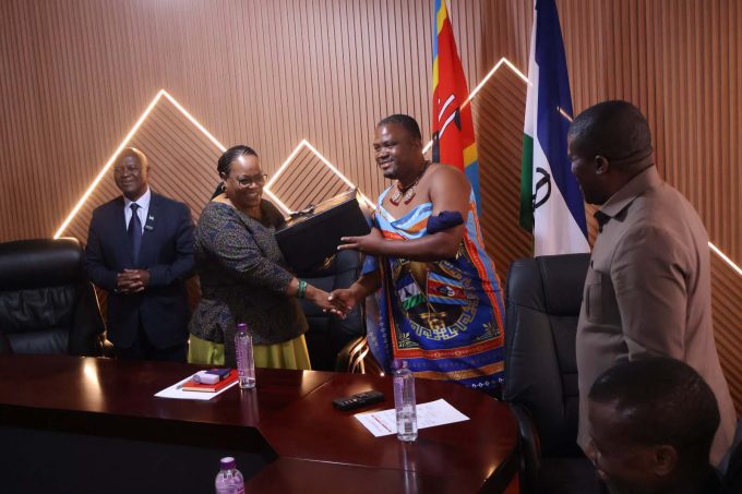 1. Lesotho Senate President being presented with gift by Minister for Tinkhundla Administration and Development Sikhumbuzo Dlamini.