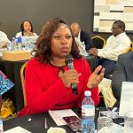 Sharon Maziya President of the Institute of People Management (IPM) Eswatini making a submission while Emmanuel Zvada, managing consultant at Third Eye Africa in Zimbabwe looks on.