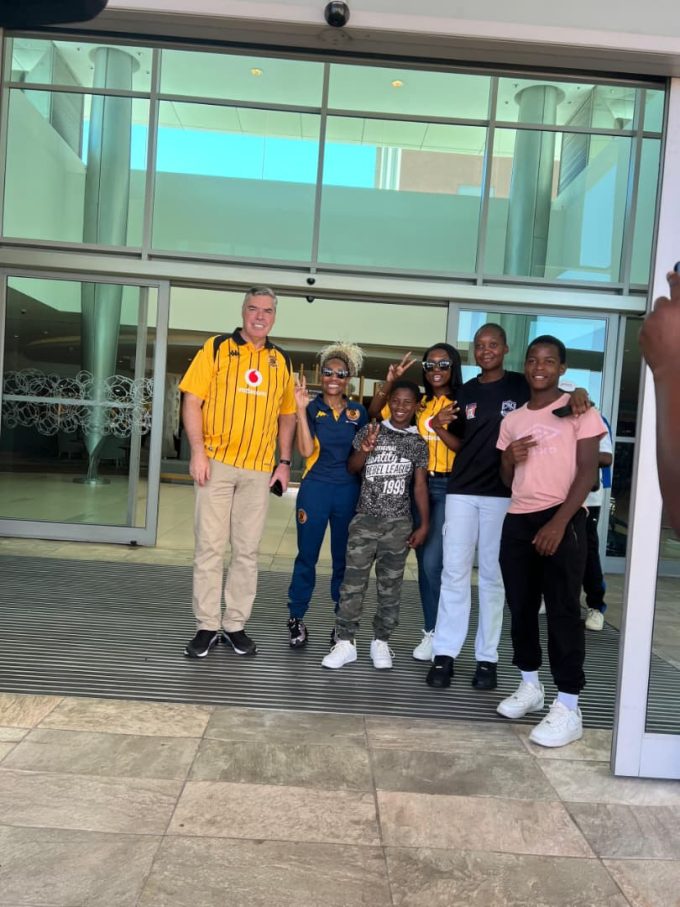 The pupils joined by KFC Eswatini CEO Nigel England (L) as they prepare for their journey to FNB Stadium.
